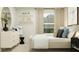 Bright and airy bedroom with stylish decor, comfortable bed, and contemporary furniture at 14984 Topaz Blue St, Wimauma, FL 33598