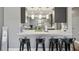 Open kitchen with stainless steel appliances and counter seating perfect for entertaining at 16076 Dawnview Dr, Tampa, FL 33624