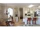 Spacious open floorplan showcasing kitchen, dining, and living area, great for entertaining at 16515 Nikki Ln, Odessa, FL 33556