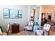 Comfortable living room with an open design, leading to other areas of the home at 16515 Nikki Ln, Odessa, FL 33556
