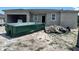 Image of a home under construction with a dumpster in front of the property at 17349 Pheasant Cir, Port Charlotte, FL 33948