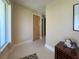 Hallway featuring neutral walls and modern doorway at 1775 62Nd S Ter, St Petersburg, FL 33712