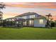 Expansive backyard featuring a screened-in patio area perfect for outdoor relaxation at 19803 Prince Benjamin Dr, Lutz, FL 33549