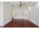 Bedroom with hardwood floors, white trim, and recessed lighting at 19803 Prince Benjamin Dr, Lutz, FL 33549