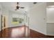 Bedroom with hardwood floors, lots of natural light, and a view of the backyard at 19803 Prince Benjamin Dr, Lutz, FL 33549