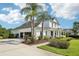 Elegant two-story home featuring a spacious driveway, two-car garage, and manicured landscaping at 19803 Prince Benjamin Dr, Lutz, FL 33549