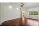 Spacious main bedroom featuring wood floors, recessed lighting, and an ensuite bathroom at 19803 Prince Benjamin Dr, Lutz, FL 33549