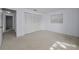 Spacious bedroom with double closet doors and window for natural light at 2212 Portside Psge, Palm Harbor, FL 34685