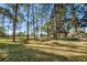 The community has beautiful grounds shaded with mature trees at 2212 Portside Psge, Palm Harbor, FL 34685
