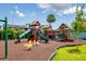 Well-equipped community playground with slides, horses, and a secure, padded ground for hours of fun at 255 114Th N Ave # 4, St Petersburg, FL 33716
