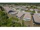 A neighborhood view with well-spaced homes and lush landscaping at 2747 Wood Pointe Dr, Holiday, FL 34691