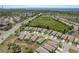 Sprawling residential neighborhood with lush greenery, serene ponds, and tree-lined streets at 2747 Wood Pointe Dr, Holiday, FL 34691