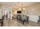 Open concept dining area with elegant decor, seamlessly connecting to other living spaces at 2747 Wood Pointe Dr, Holiday, FL 34691