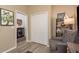 Neutral sitting room with storage and a view into another space at 2747 Wood Pointe Dr, Holiday, FL 34691
