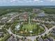 Expansive aerial view of the community featuring a recreation area and lakes at 3095 Riders Pass, Odessa, FL 33556