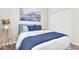 Comfortable bedroom with a queen bed, soft bedding, and closet at 3095 Riders Pass, Odessa, FL 33556