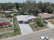 Aerial view of the home showcases its lot size and proximity to nearby homes at 3104 W Powhatan Ave, Tampa, FL 33614