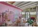 Enclosed patio features a table and chairs, with views of the outdoor area at 3104 W Powhatan Ave, Tampa, FL 33614