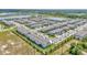 Panoramic aerial shot showing the community's layout, landscaping, and multiple serene lakes at 3228 Bryant Park Dr, New Port Richey, FL 34655