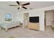 Bright bedroom with a ceiling fan and natural light at 3228 Bryant Park Dr, New Port Richey, FL 34655