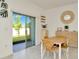 Dining room with sliding glass doors to the backyard and patio at 3228 Bryant Park Dr, New Port Richey, FL 34655