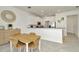 Modern kitchen with sleek white cabinets, stainless steel appliances, and granite countertops at 3228 Bryant Park Dr, New Port Richey, FL 34655