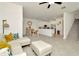 A welcoming living area that flows into the dining area and showcases the kitchen at 3228 Bryant Park Dr, New Port Richey, FL 34655