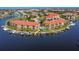 Waterfront condos with boat docks, community pool, well-maintained grounds, and lush landscaping at 3334 Purple Martin Dr # 212, Punta Gorda, FL 33950