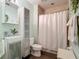 Well-lit bathroom featuring a modern vanity, neutral tile shower, and sleek fixtures for a clean, contemporary feel at 3334 Purple Martin Dr # 212, Punta Gorda, FL 33950
