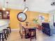 Open concept with dining area featuring modern decor, tile floors and plenty of natural light at 3334 Purple Martin Dr # 212, Punta Gorda, FL 33950
