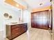 Kitchen area featuring dark wood cabinetry, granite countertops, and stainless steel appliances at 3334 Purple Martin Dr # 212, Punta Gorda, FL 33950