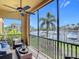 Relax and unwind on this spacious lanai offering stunning views of the canal and boat docks, ideal for waterfront living at 3334 Purple Martin Dr # 212, Punta Gorda, FL 33950