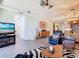 Living room featuring modern decor, tile floors, and easy access to the other rooms in the house at 3334 Purple Martin Dr # 212, Punta Gorda, FL 33950