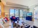 Comfortable living room area with plenty of natural light and view to exterior porch at 3334 Purple Martin Dr # 212, Punta Gorda, FL 33950