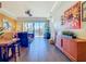 Bright and airy living room featuring an open floor plan and sliding glass doors to the outside at 3334 Purple Martin Dr # 212, Punta Gorda, FL 33950