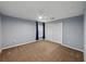 A minimalist bedroom design featuring neutral-toned walls, carpeting, and a spacious closet with ample storage at 3909 Valrico Grove Dr, Valrico, FL 33594