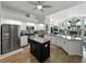 Spacious kitchen featuring granite countertops, stainless steel appliances, and an island at 3909 Valrico Grove Dr, Valrico, FL 33594