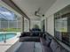 Outdoor patio area with ample seating and views of the pool and yard at 3909 Valrico Grove Dr, Valrico, FL 33594