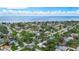 Scenic aerial view of the neighborhood with a glimpse of the bay, highlighting the property's proximity to the water at 4230 Indianapolis Ne St, St Petersburg, FL 33703