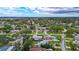 An aerial view of the home and neighborhood, showcasing the property's location in a quiet residential area at 4230 Indianapolis Ne St, St Petersburg, FL 33703