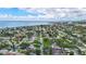 Scenic aerial view of the neighborhood with a glimpse of the bay, highlighting the property's proximity to the water at 4230 Indianapolis Ne St, St Petersburg, FL 33703