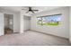 Bedroom features a large window and a closet, offering both natural light and storage space at 4230 Indianapolis Ne St, St Petersburg, FL 33703