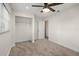Bedroom features a walk-in closet and a window, offering both storage space and natural light at 4230 Indianapolis Ne St, St Petersburg, FL 33703