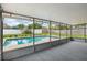 Screened-in pool area features an inviting pool with ample space for outdoor relaxation and entertainment at 4230 Indianapolis Ne St, St Petersburg, FL 33703