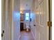 Bathroom featuring wood flooring, a toilet, and a dark vanity at 4750 Augusta Ave, Oldsmar, FL 34677