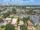 Aerial view of the home in a suburban neighborhood near the city skyline at 506 S Melville Ave, Tampa, FL 33606