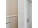 Bright white tiled bathroom featuring a shower with modern fixtures and traditional trim at 506 S Melville Ave, Tampa, FL 33606
