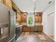 Spacious kitchen featuring stainless steel appliances and wood cabinets at 506 S Melville Ave, Tampa, FL 33606