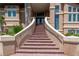 Beautiful front entryway with elegant brick steps and manicured landscaping at 514 Harbor N Dr, Indian Rocks Beach, FL 33785