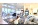 Inviting living room with tile floors, comfortable seating, water views, and an abundance of natural light at 514 Harbor N Dr, Indian Rocks Beach, FL 33785